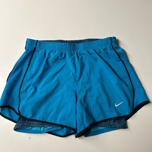 Blue Nike dry fit running shorts size extra small